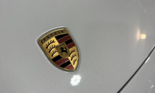 Porsche emblem protected with ceramic coating service in Colorado Springs
