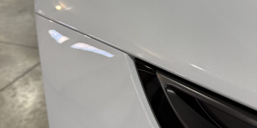 Precision paint protection film application on white vehicle in Colorado Springs